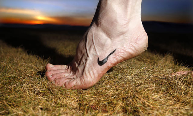 running barefoot on grass